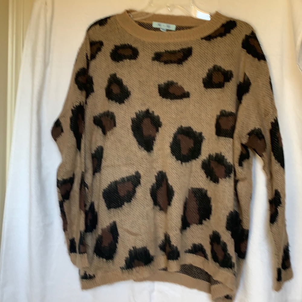Brown and Black sweater, one size. Soft. Mild wear